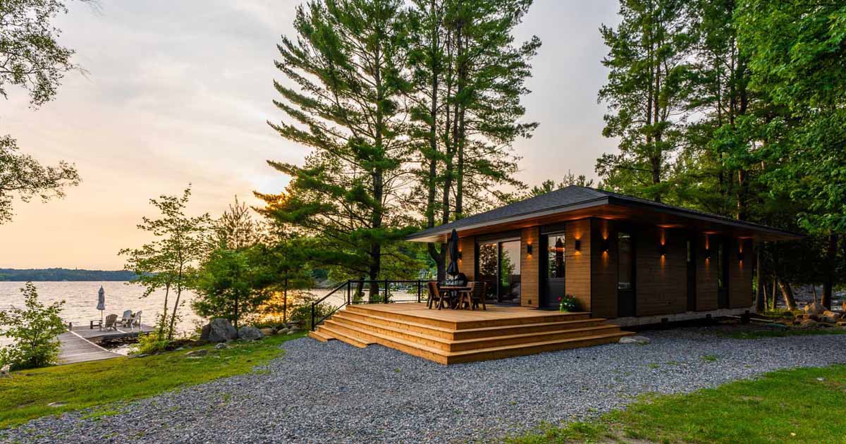 Exposed Wood Posts & Beams Add A Warm Rustic Touch To This Small Cabin