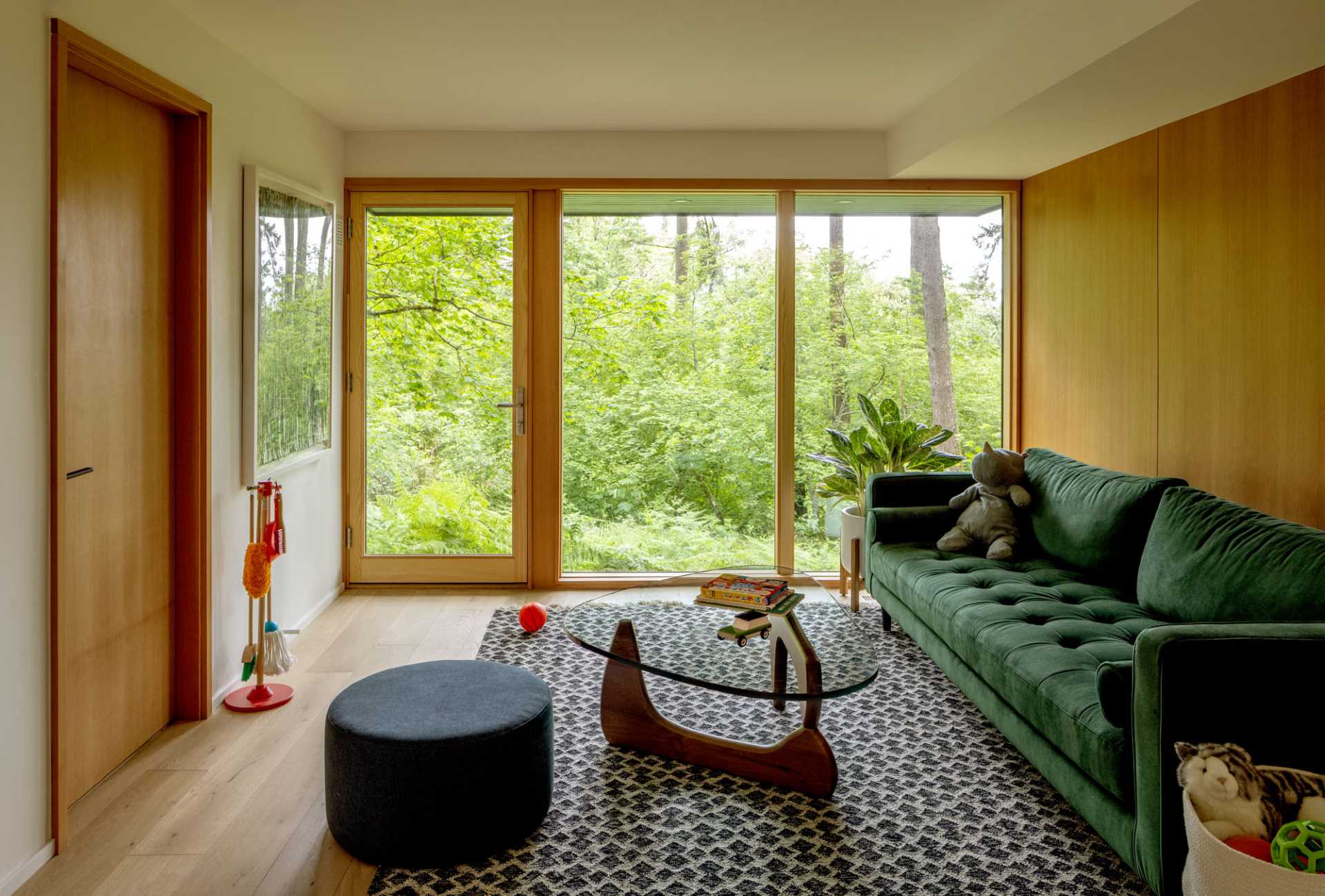 A modern sitting area with custom Fir paneling on the wall.