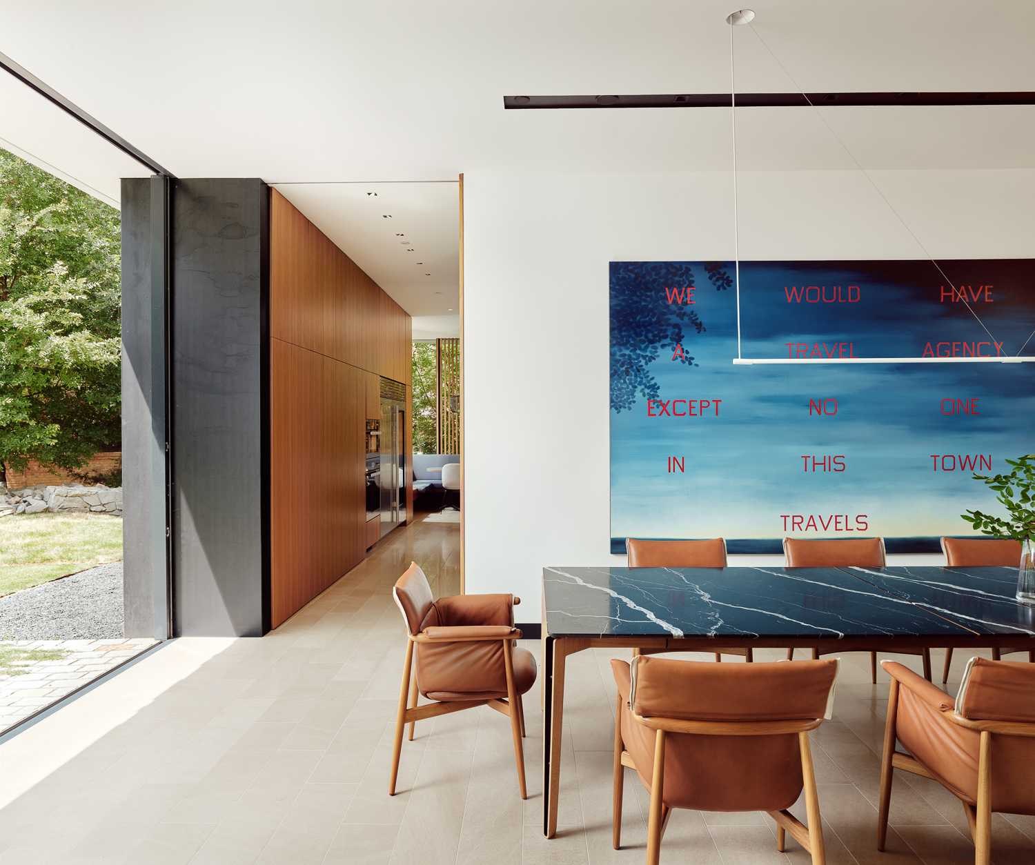 A modern home with an open-plan dining room.